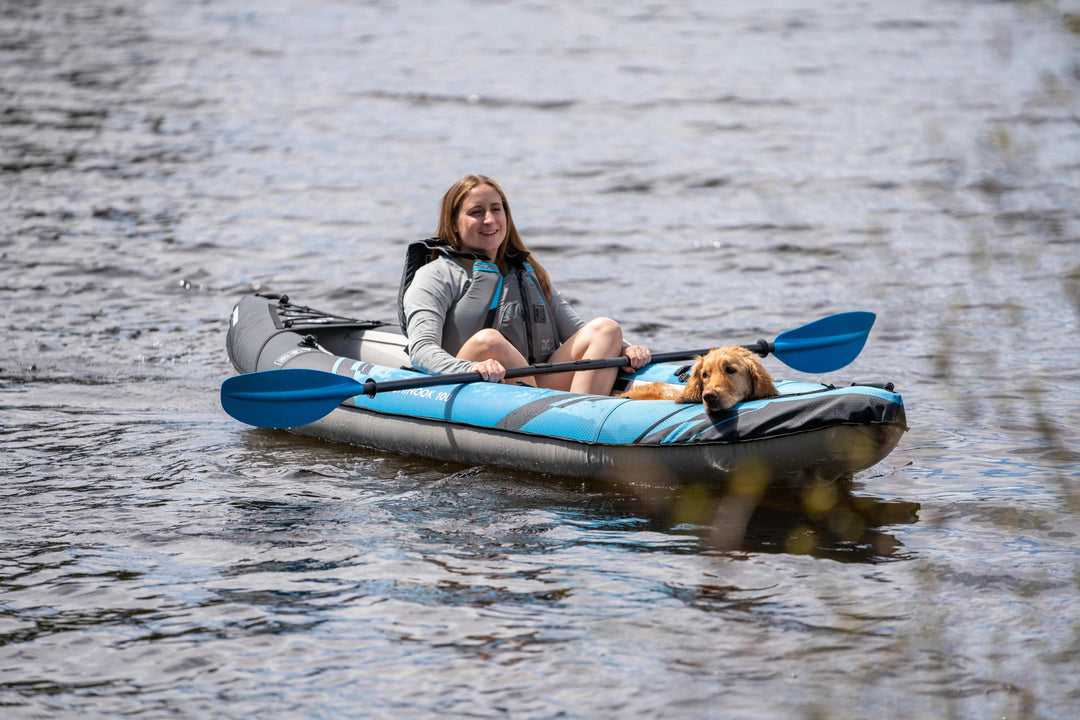 Paddle with a dog on the Chinook 100 recreational kayak in calm water.