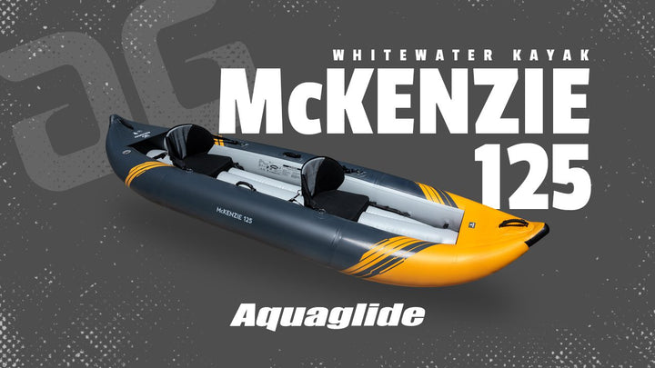 The McKenzie 125 is a gray/orange tandem whitewater kayak by Aquaglide.